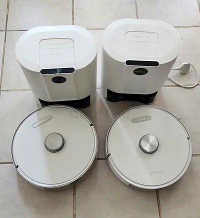 Pair of Ultenic Robot Vacuums with Auto-Empty Docking Stations (Used)