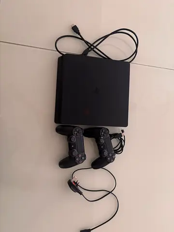 PS4 Slim 500GB + Original Controller – Fully Working  Clean Condition