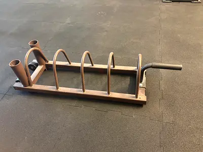 Weight plate and barbell holder