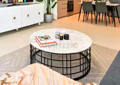 Round Marble Top Coffee Table with Black Grid Base