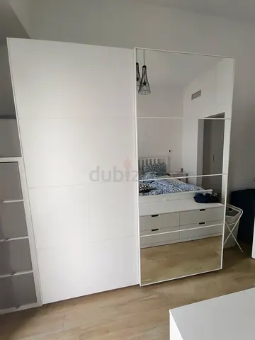 White Sliding Wardrobe with Mirror Panels and Drawers