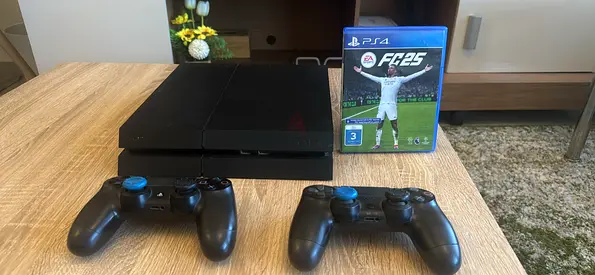 PS4 Pro with Two controllers and a FC 25 Disc