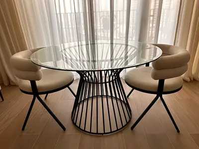 Round Glass Dining Table with Black Metal Base — 4-Seater