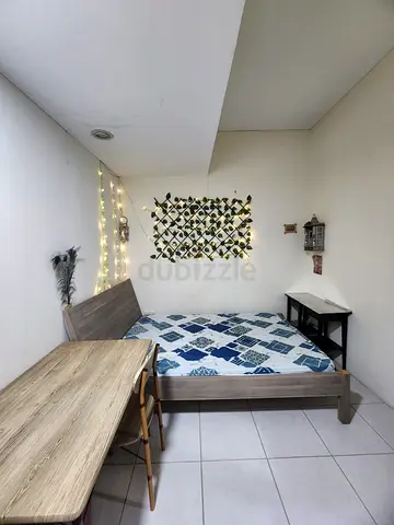 Spacious Partition Room for Bachelor/Couples in Al mankhool near to sharaf dg metro station