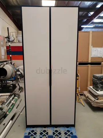 Slim Two-Door Wardrobe with Matte White Panels and Black Frame in good condition