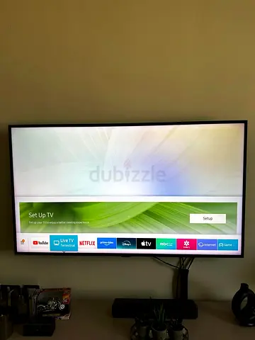 Samsung 49-inch Smart UHD TV - With Wall and Table Mount, Good Condition.