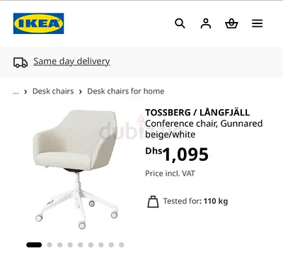 Light grey swivel office chair with armrests - good condition was bought for 1,095 AED