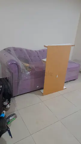Three-seater purple velvet sofa in good condition