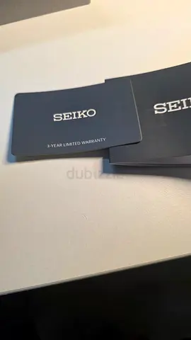 Seiko watch with original warranty cards (watch not shown) or Seiko warranty pack