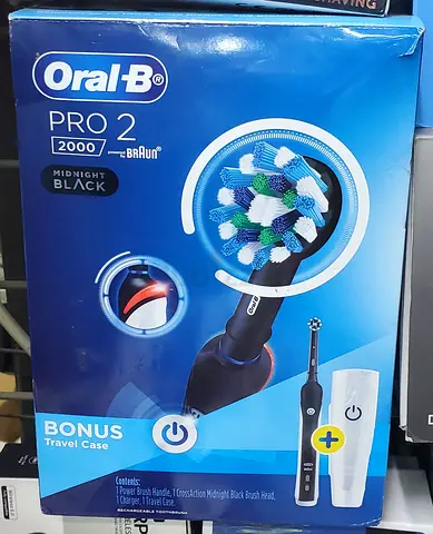 Oral-B Pro 2 2000 Rechargeable Electric Toothbrush, White Handle, 1 Sensi Ultrathin Brush Head