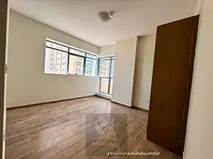 A brand-new two-bedroom apartment with a living room, featuring a modern design and comfortable layo