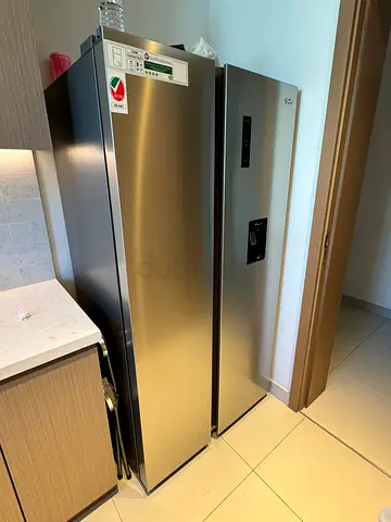 LG Tall Stainless Steel Refrigerator with Water Dispenser - Good Condition