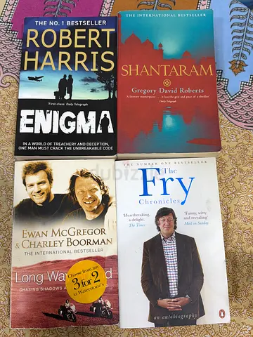 Set of 4 Paperback Novels and Memoir (Shantaram, The Fry Chronicles, Enigma, Long Way Round)