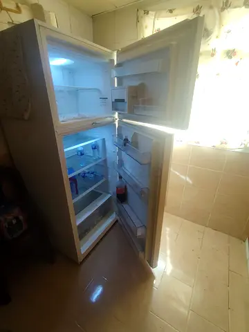 Used Top-Freezer Refrigerator in Good Working Condition