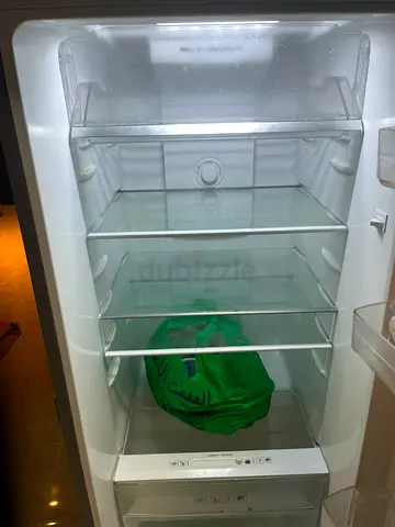 Silver double-door refrigerator - good working condition