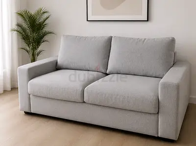 Beige 2-seater sofa in good condition