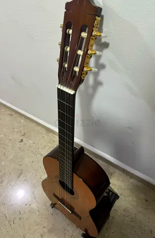 Classic nylon-string acoustic guitar in good used condition