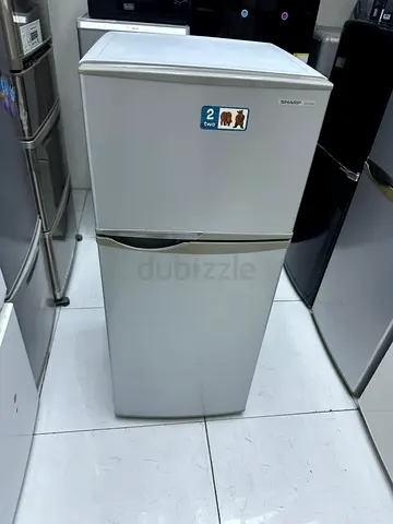 Sharp small refrigerator double door neat and clean perfect working