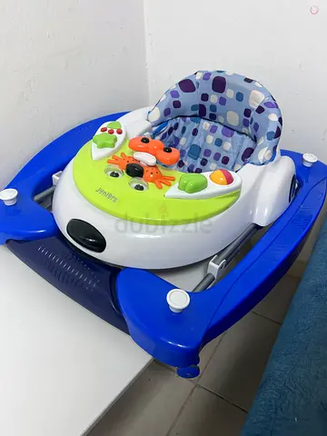 Baby walker with music and activity tray - good condition