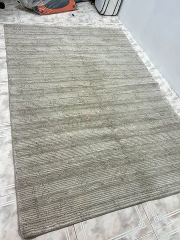 Light grey textured area rug - good used condition