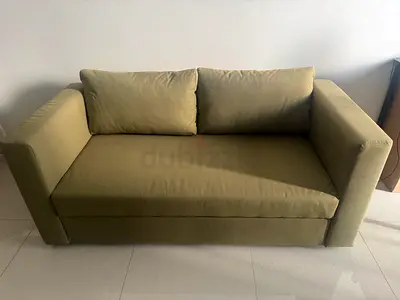 2-seater olive green fabric sofa in excellent condition