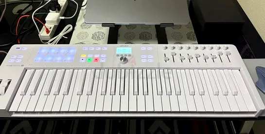 Arturia white MIDI Keyboard Controller with Pads and Faders - 49 Keys