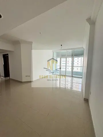 No commission. Al Taawun apartment, two bedrooms (one master), living room, three bathrooms, balcony, gym, and swimming pool.