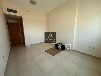 Apartment for annual rent in Ajman, Al Rashidiya 1, near Al Mina Street, two bedrooms and a living room