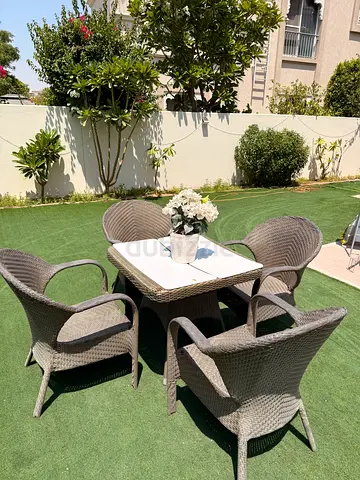 Outdoor rakutan table with 4 chairs