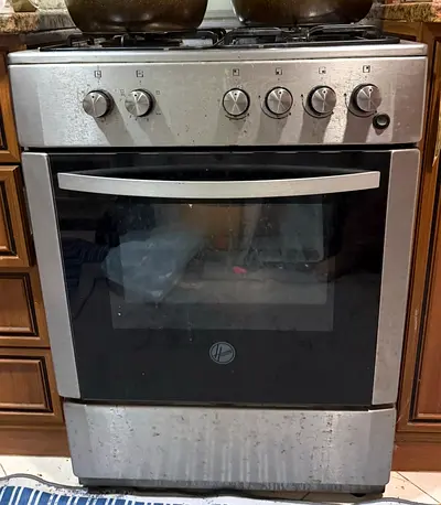 Used stainless steel freestanding gas oven and stove - working condition