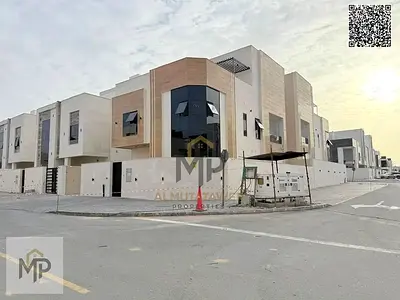 Villa for sale in Ajman Corner | Al Helio 2 area | 6 bedrooms, majlis, 2 living rooms, and roof terrace | Freehold | Price includes registration fees