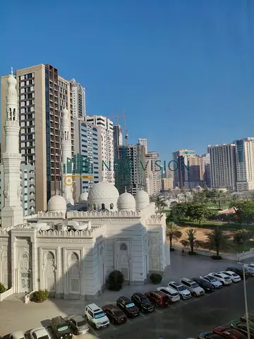Master Bedroom with Built-in Wardrobes, Living Room with Balcony, Garden View, Prime Location Near Dubai Exit