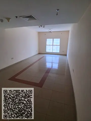 One-bedroom apartment for annual rent in Al Rashidiya 3, powered by natural gas, spacious apartment.
