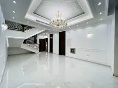 Luxury classic villa with five master bedrooms, maid's room, and a pool for sale in Ajman – Al