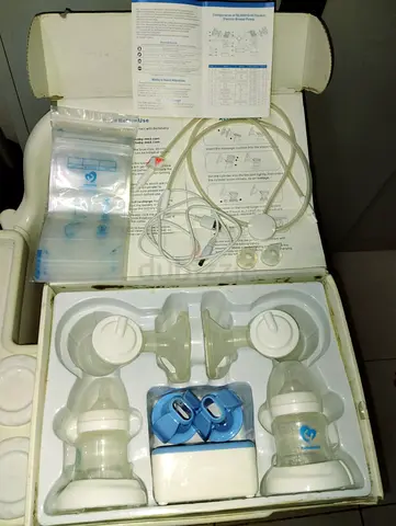 Electric Double Breast Pump with Bottles and Accessories - Good Condition
