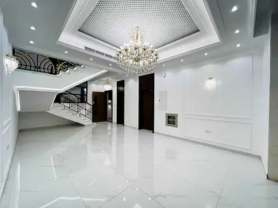 Luxury classic villa with five master bedrooms, maid's room, and a pool for sale in Ajman – Al Heli