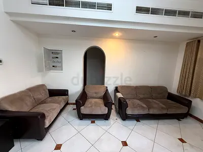 3-piece brown fabric and leather sofa set — 2 seater, 3 seater and armchair