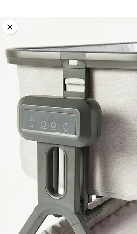 Lightly used bedside bassinet with adjustable attachment - grey