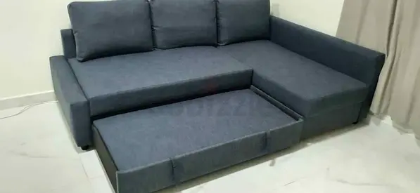 IKEA L shap Sofa store cum bed you can fix the storage