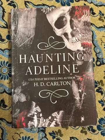 Haunting Adeline by H. D. Carlton