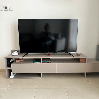 TV stand, made in Italy, with two shelves.