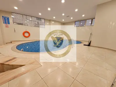 Free Gym & Pool with Free Year-Round Maintenance | 2BR + Hall with Balcony & Open View | Prime Location Near Dubai Exit & All Services