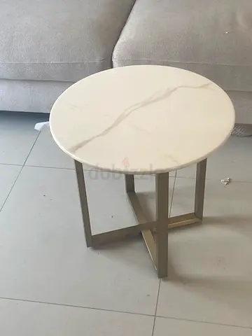 Small round marble-effect side table with metal legs
