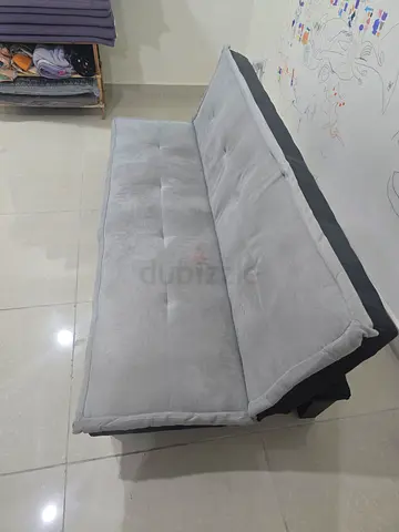 Grey convertible sofa bed / futon in good condition