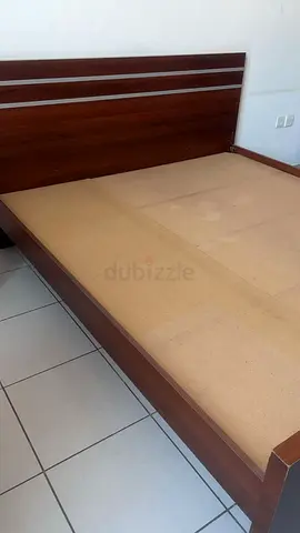 King wooden bed frame with headboard - good condition