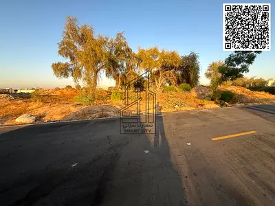 Two adjacent and contiguous plots of land for sale in Al-Haliu 1, including registration and ownership fees twice.