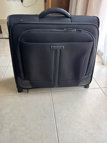Black Carry-On Roller Luggage - Good Condition