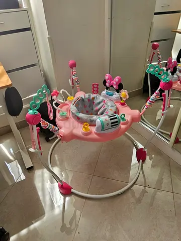 Pink baby jumper  walker activity seat with toy tray — gently used