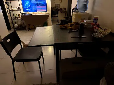 Solid dark wood dining table with 4 chairs - used