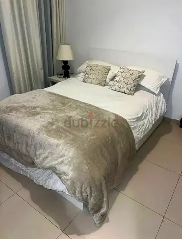 Ikea Queen size bed with mattress available in perfect condition